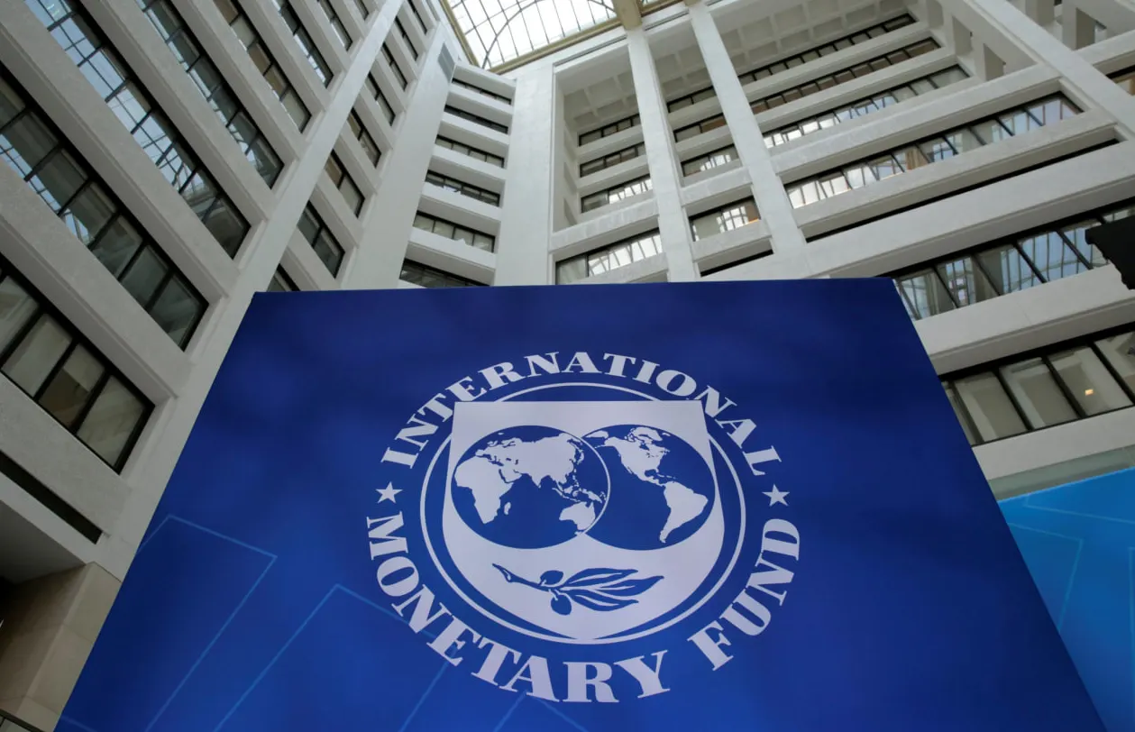 International Monetary Fund logo on a blue panel in the atrium of the IMF headquarters in Washington, US