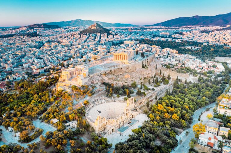 Aerial view of the Acropolis of Athens with the Parthenon and the Odeon of Herodes Atticus above the city, with Lycabettus Hill behind