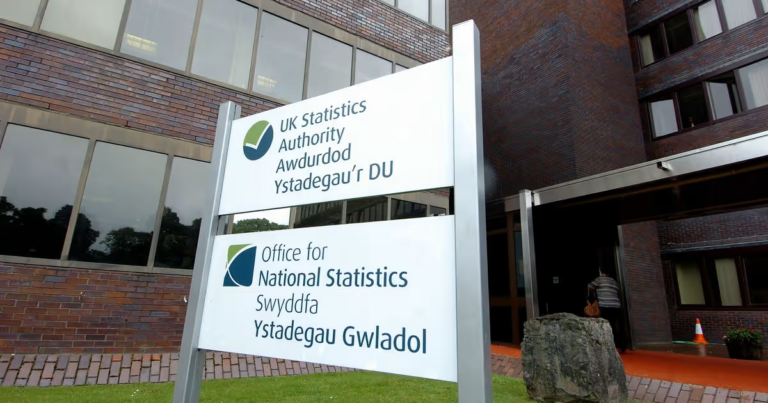 Signs of the UK Statistics Authority and the Office for National Statistics, in English and Welsh, outside an ONS office building
