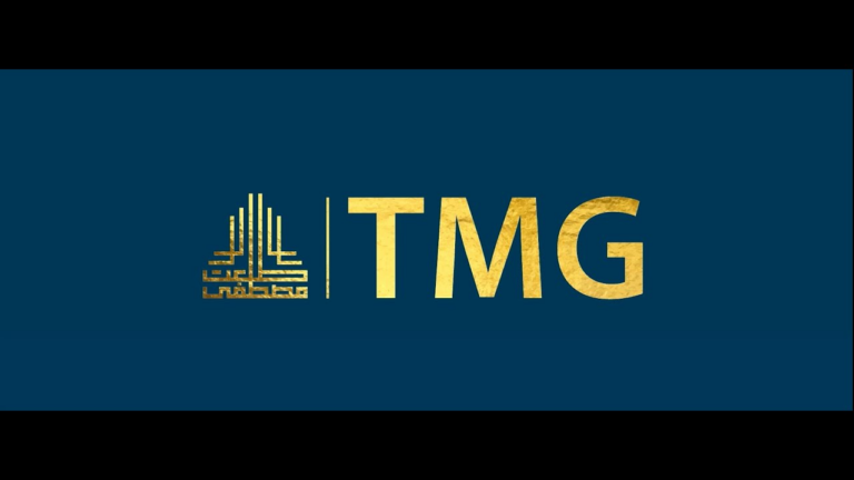 The Talaat Moustafa Group (TMG) logo in gold on a navy background, Egypt
